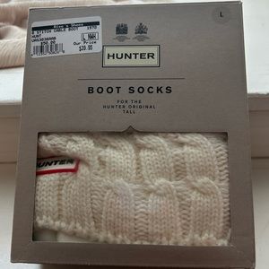 Hunter boot socks size large. White knit 6 stitch cable boot socks. New in box.